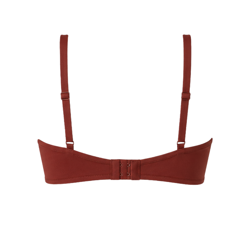 red bra with straps on a white background